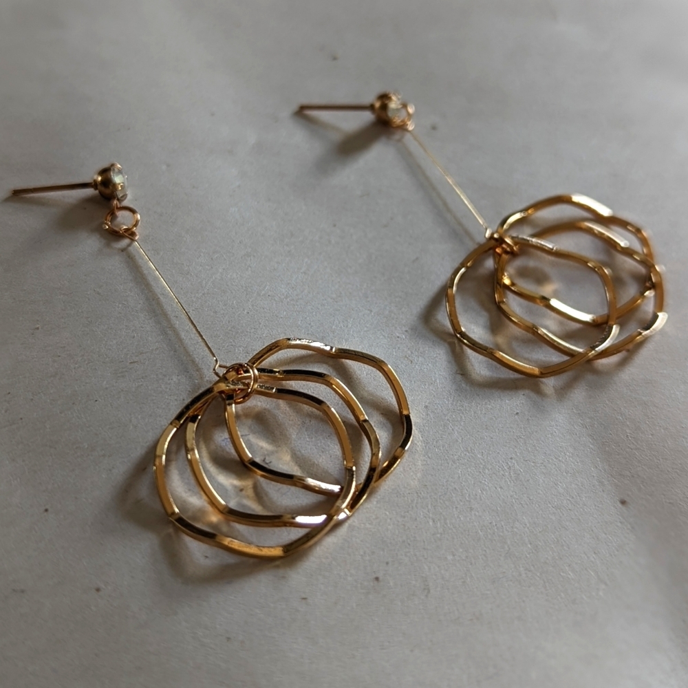 Earrings - Dangling gold with hoops at the end